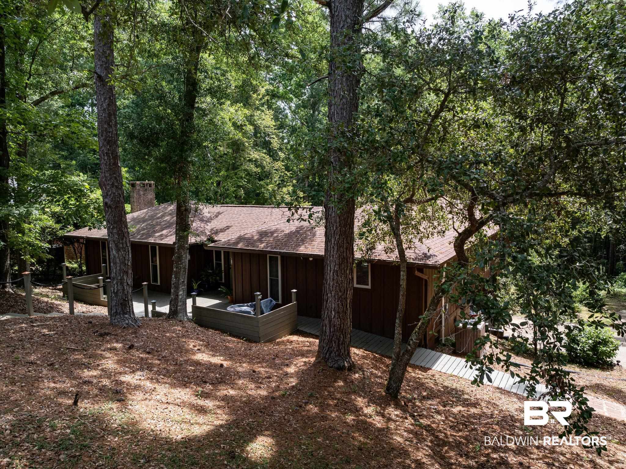 40 Caisson Trace Daphne, AL 36527 - Photo 2 of 54 Exterior space with an outdoor hangout area and a patio area