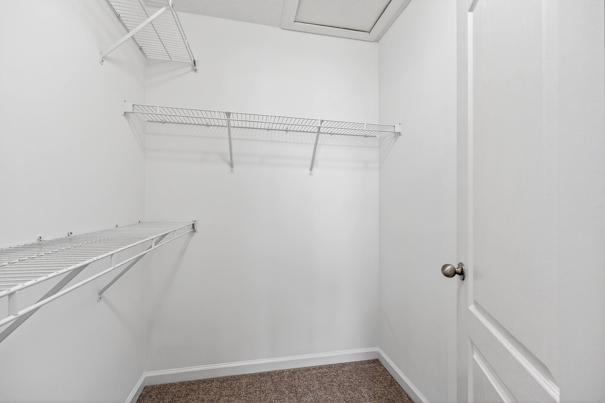 325 Indian Springs Circle Manchester, TN 37355 - Photo 21 of 29 a view of a room with racks on the wall