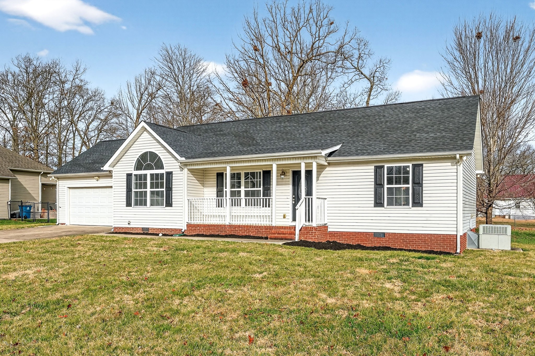 325 Indian Springs Circle Manchester, TN 37355 - Photo 27 of 29 a front view of a house with a yard