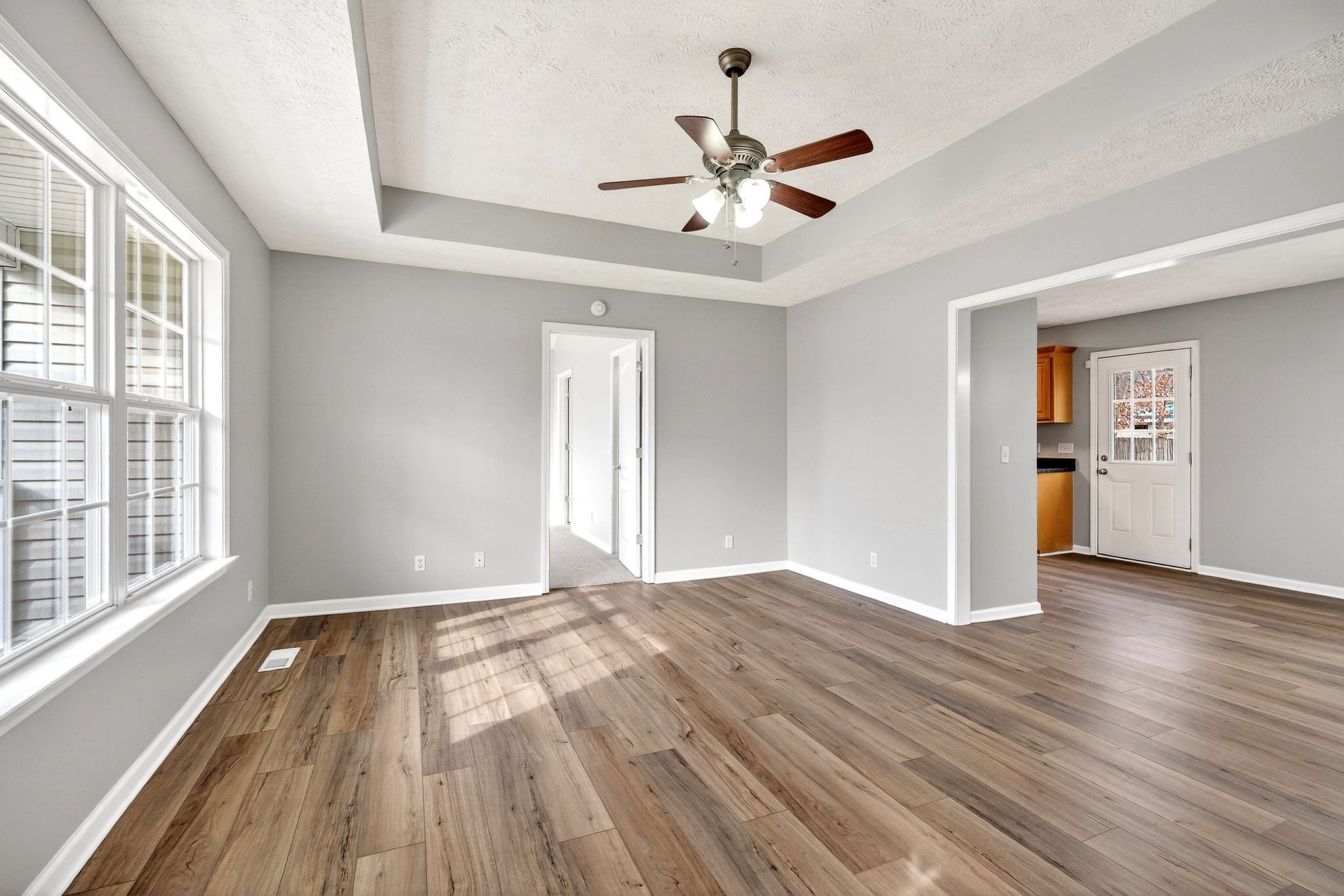 325 Indian Springs Circle Manchester, TN 37355 - Photo 3 of 29 a view of empty room with wooden floor and fan