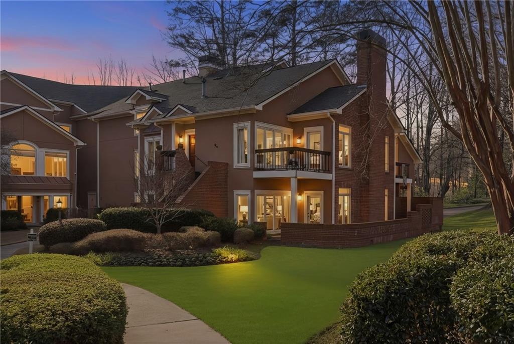 5264 Brooke Ridge Drive Dunwoody, GA 30338 - Photo 1 of 47 a view of a house with backyard and sitting area