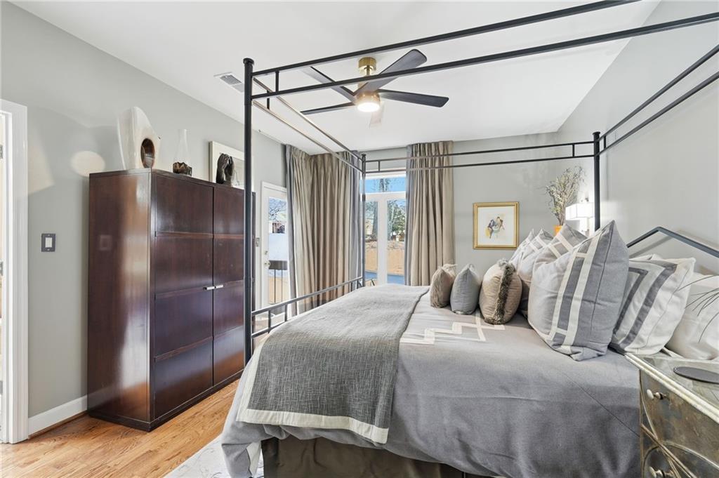 5264 Brooke Ridge Drive Dunwoody, GA 30338 - Photo 14 of 47 a bedroom with a bed window and walk in closet