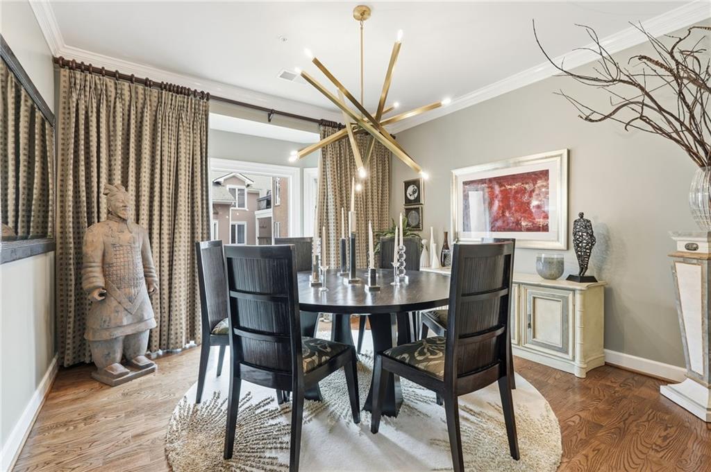 5264 Brooke Ridge Drive Dunwoody, GA 30338 - Photo 22 of 47 a view of a dining room with furniture and a chandelier