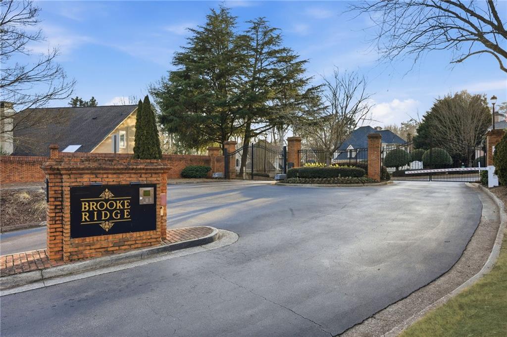 5264 Brooke Ridge Drive Dunwoody, GA 30338 - Photo 37 of 47 a view of street with sign board