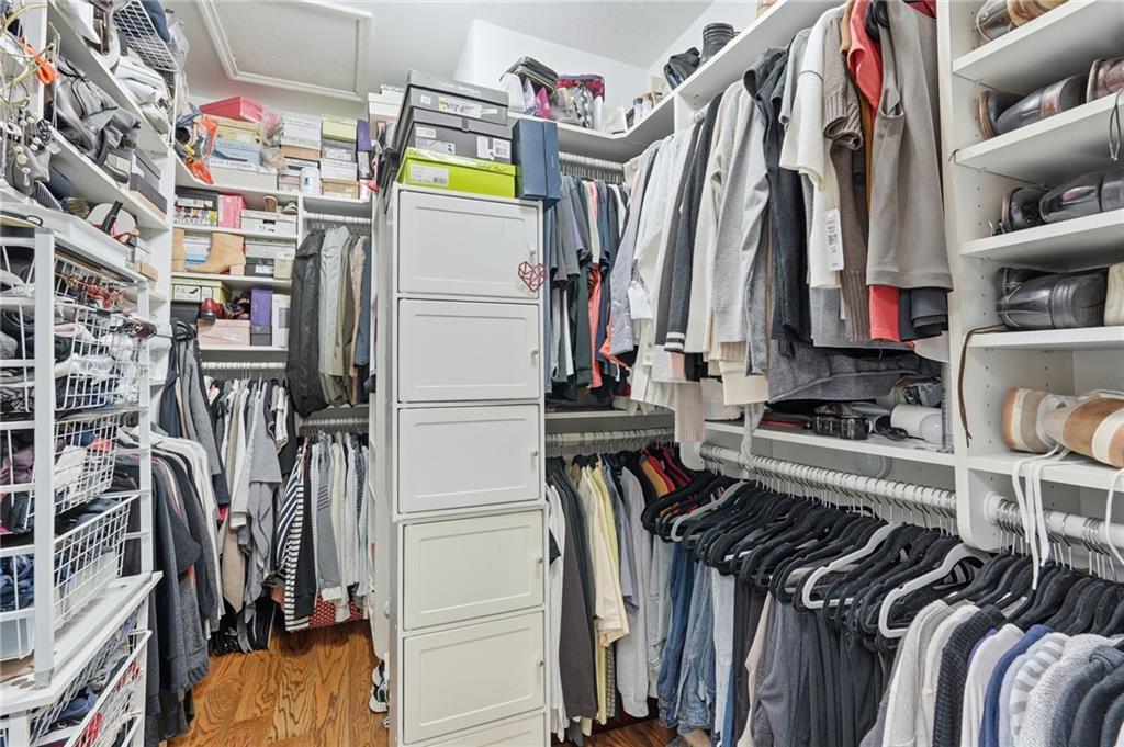 5264 Brooke Ridge Drive Dunwoody, GA 30338 - Photo 38 of 47 a view of walk in closet with clothes and shoes