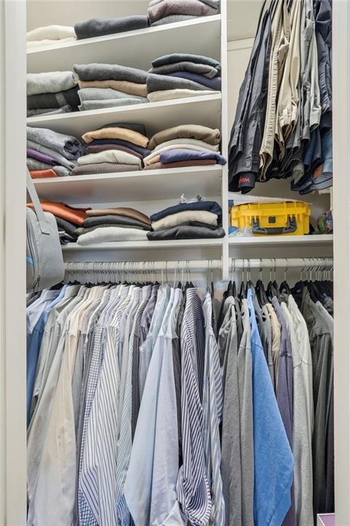 5264 Brooke Ridge Drive Dunwoody, GA 30338 - Photo 39 of 47 a view of walk in closet with clothes and shoes