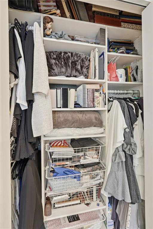 5264 Brooke Ridge Drive Dunwoody, GA 30338 - Photo 41 of 47 a view of walk in closet with clothes and shoes