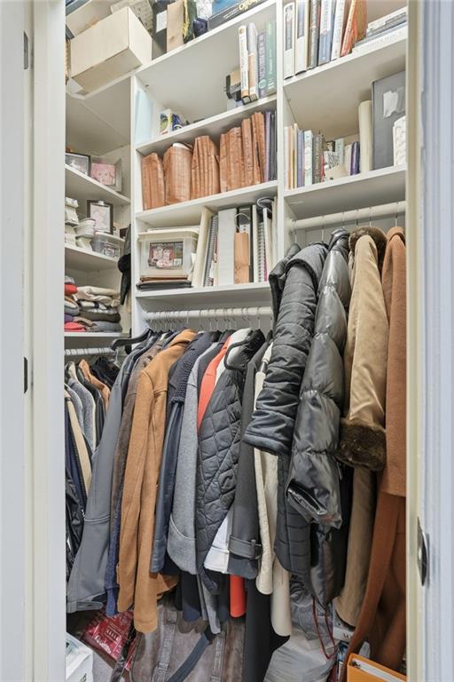 5264 Brooke Ridge Drive Dunwoody, GA 30338 - Photo 42 of 47 a view of walk in closet with clothes and shoes