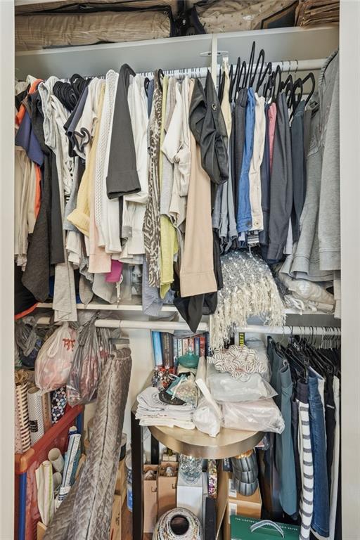 5264 Brooke Ridge Drive Dunwoody, GA 30338 - Photo 45 of 47 a view of walk in closet with clothes and shoes