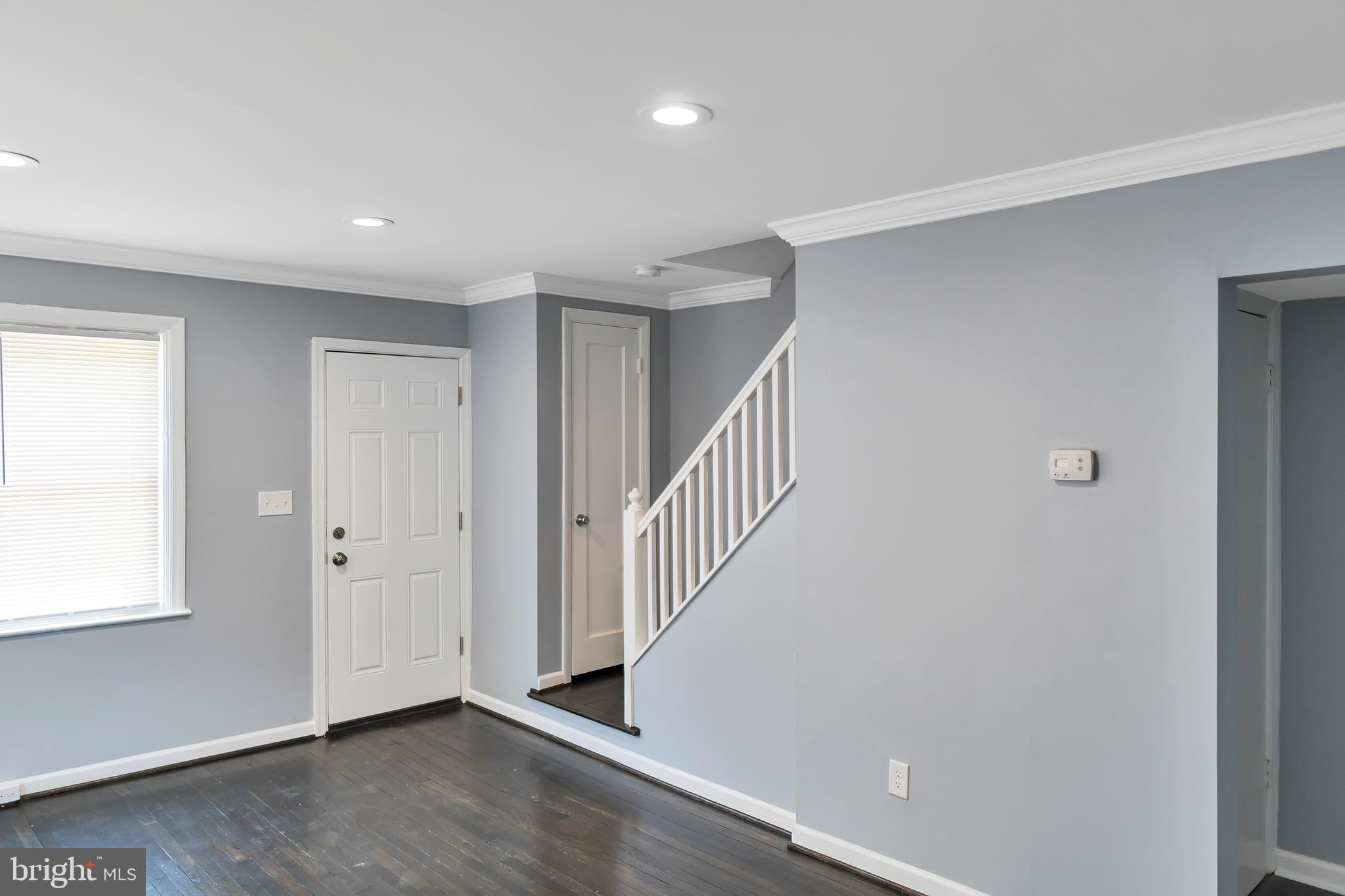 4516 Mountview Road Baltimore, MD 21229 - Photo 11 of 25 Front Door View With Leading Stairway Upstairs