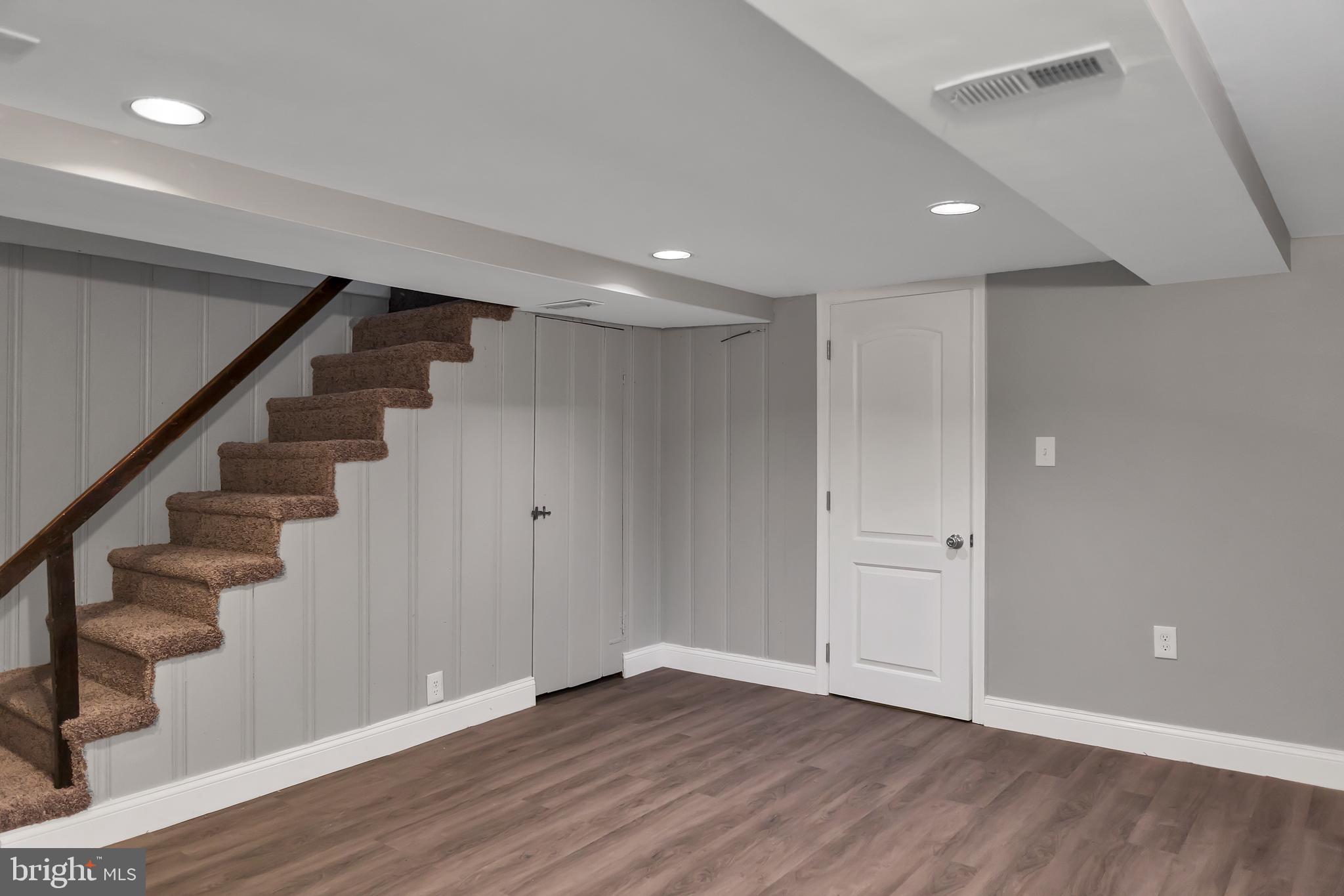 4516 Mountview Road Baltimore, MD 21229 - Photo 23 of 25 Lower Level Stairs W/Upgraded Flooring & Lights