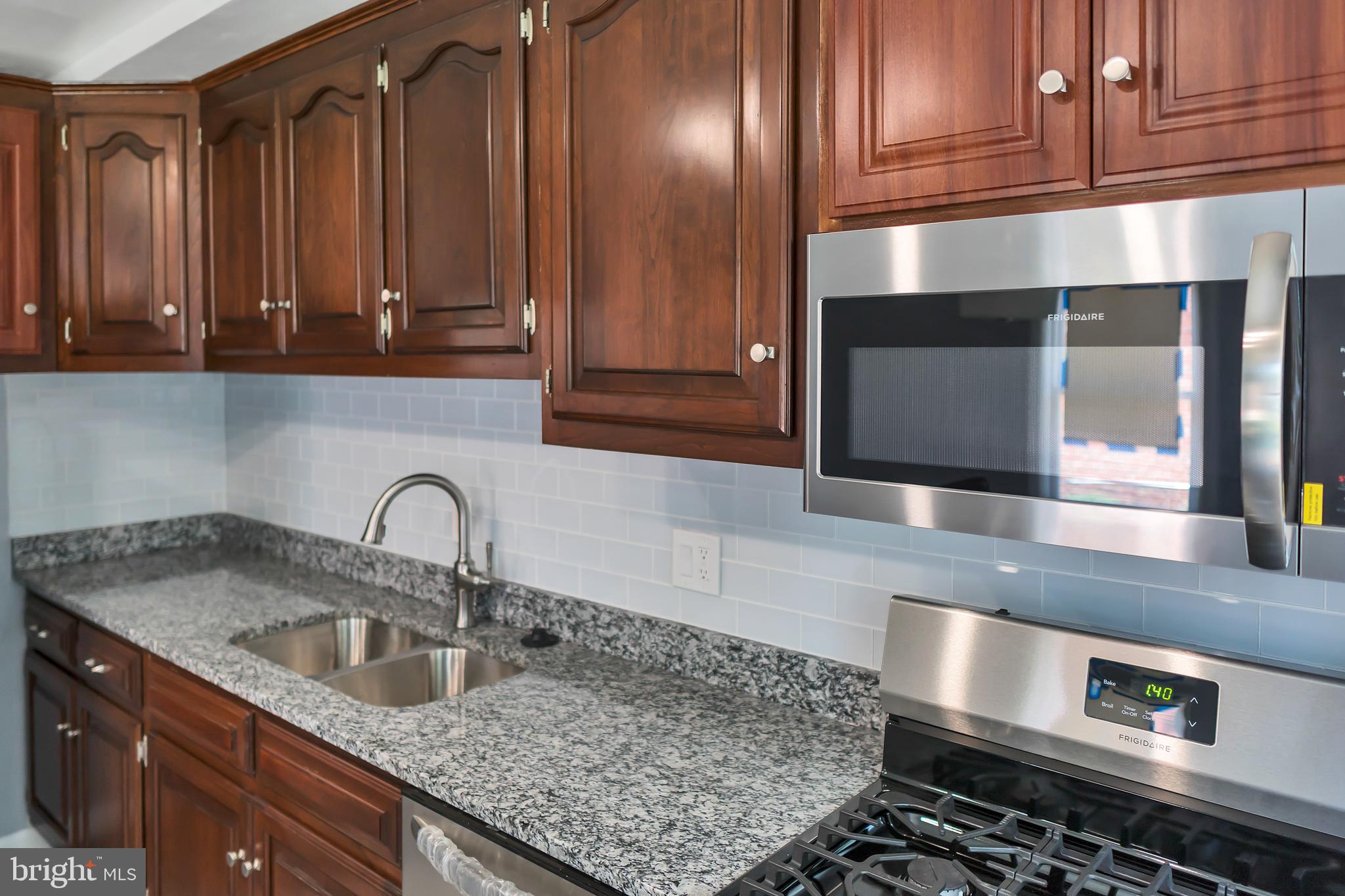4516 Mountview Road Baltimore, MD 21229 - Photo 5 of 25 Granite Counter Top With Awesome Kitchen Cabinetry