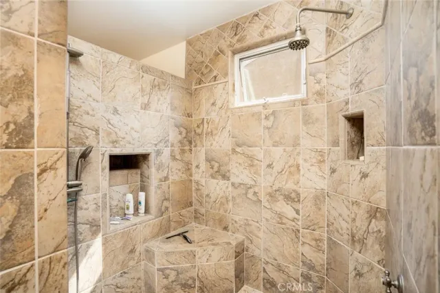 a bathroom with a sink a vanity and a mirror