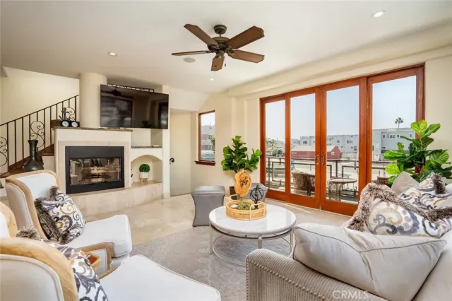 a kitchen with stainless steel appliances granite countertop a stove a sink and a wooden floors