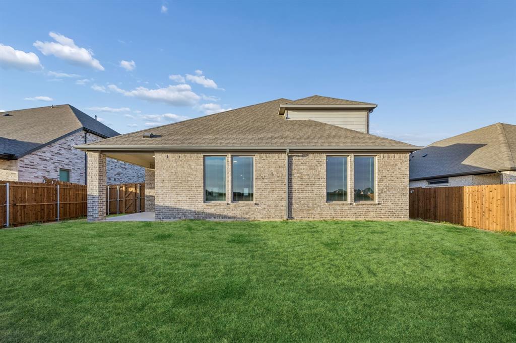 1404 Companero Street Haslet, TX 76052 - Photo 40 of 40 Covered Patio in the Wimbledon home plan by Trophy Signature Homes – REPRESENTATIVE PHOTO