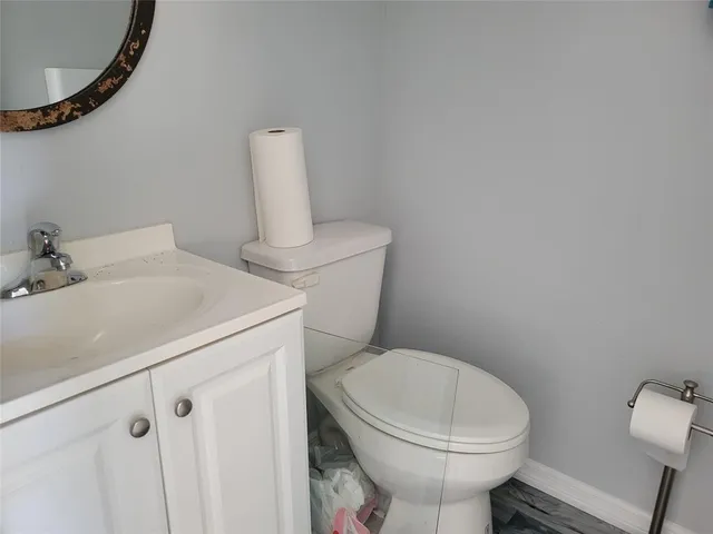 a bathroom with a sink and a toilet