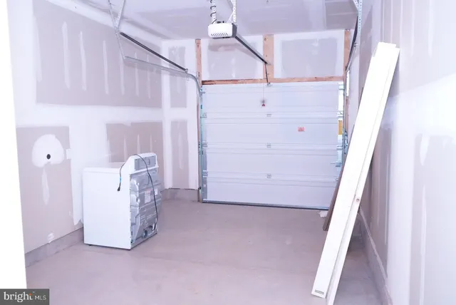 a view of a hardwood & an entryway