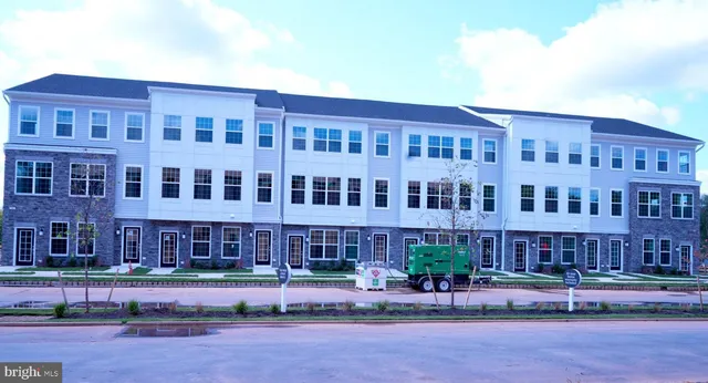 a front view of a building with street view