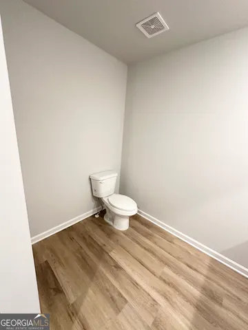 a bathroom with a toilet