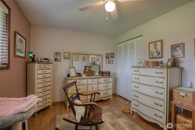 a view of a workspace with furniture