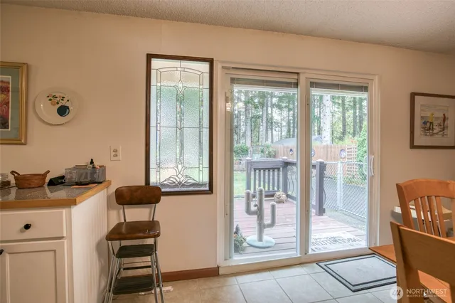 a view of a livingroom with furniture and windows