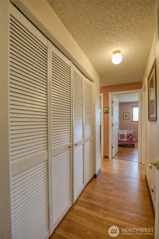 a view of a livingroom with a kitchen