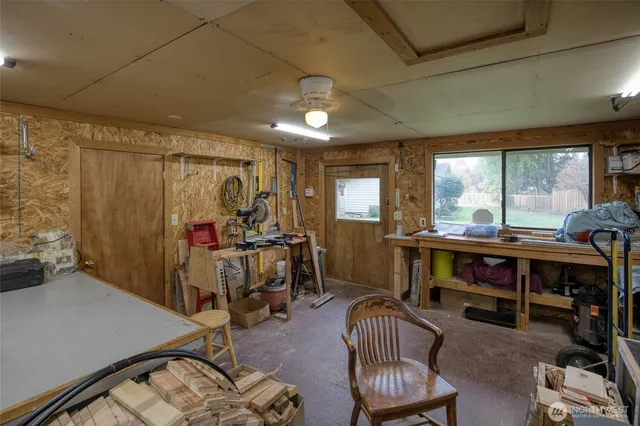 a view of a livingroom with furniture and windows