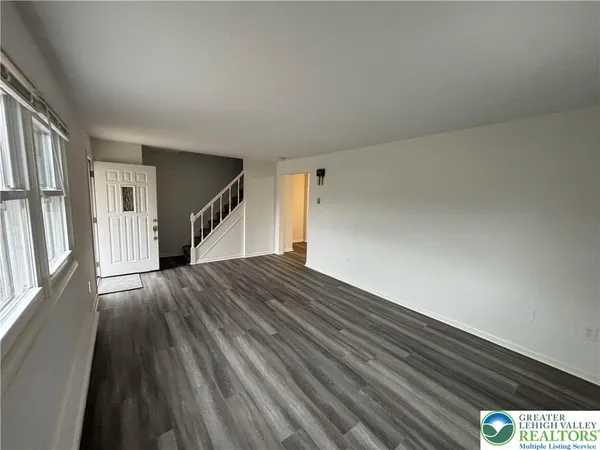 a view of an empty room and window