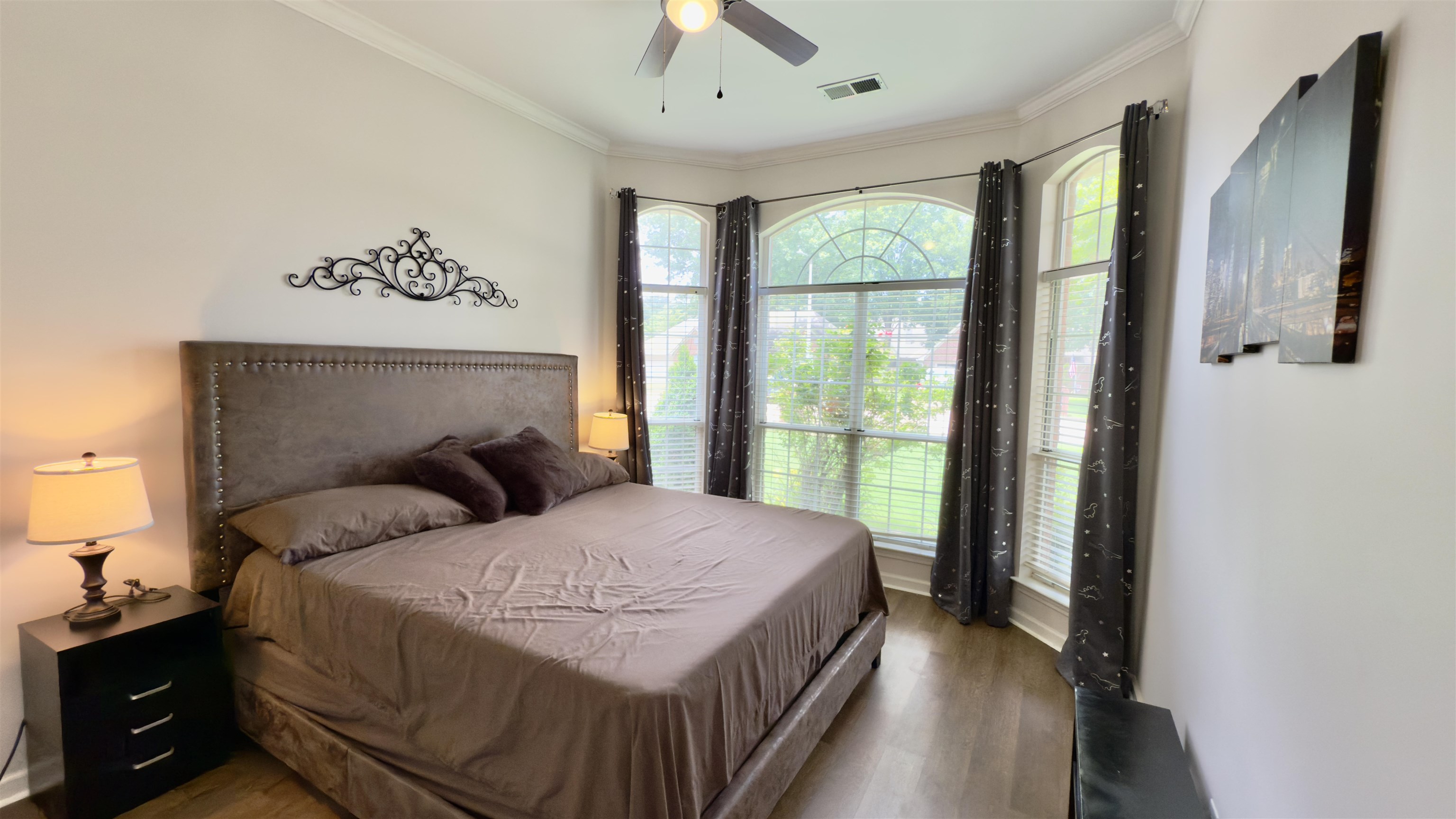 1082 Sugar Lane Collierville, TN 38017 - Photo 14 of 25 a bedroom with a large bed and a window