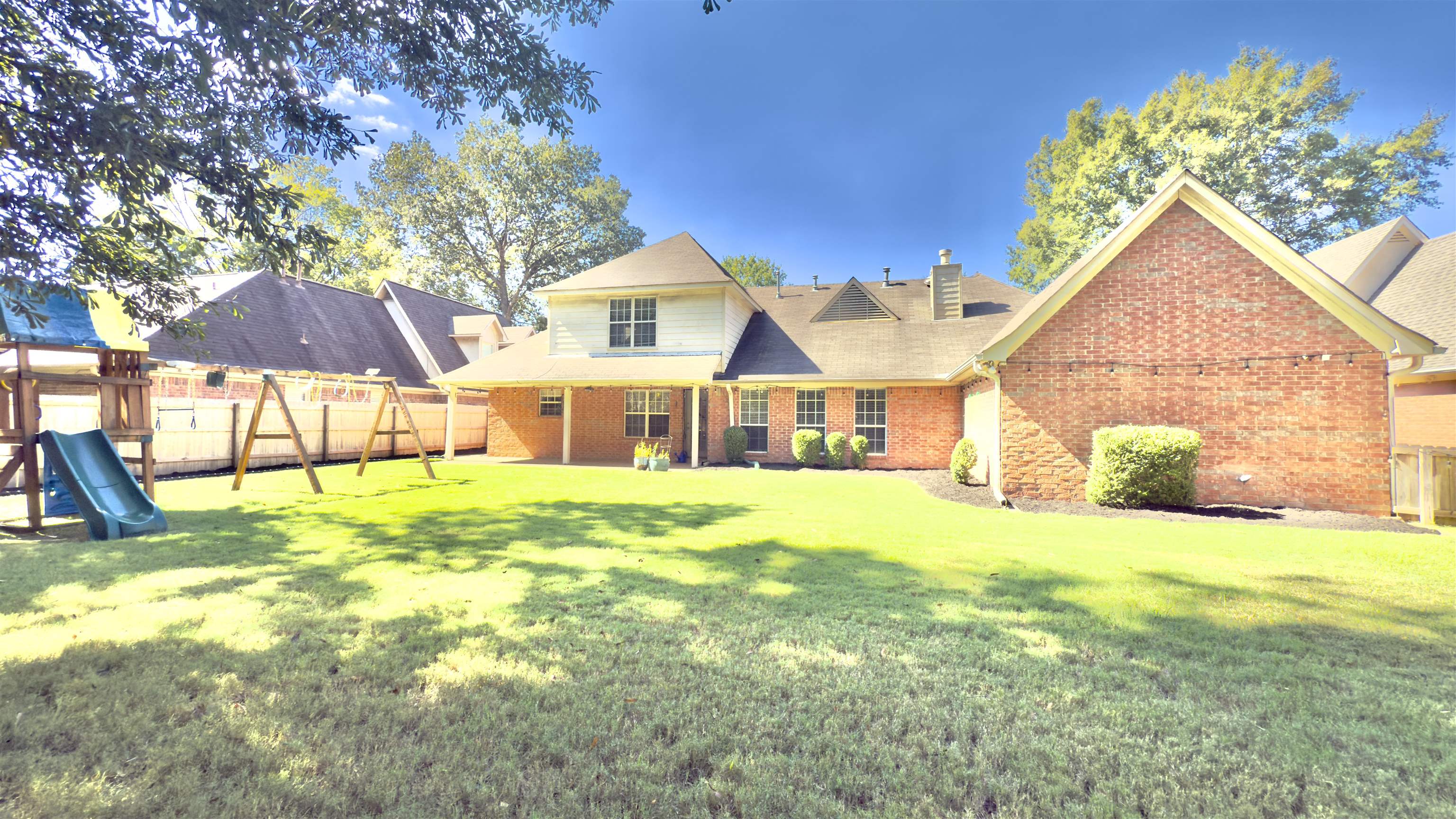 1082 Sugar Lane Collierville, TN 38017 - Photo 21 of 25 a view of a house with a yard and sitting area
