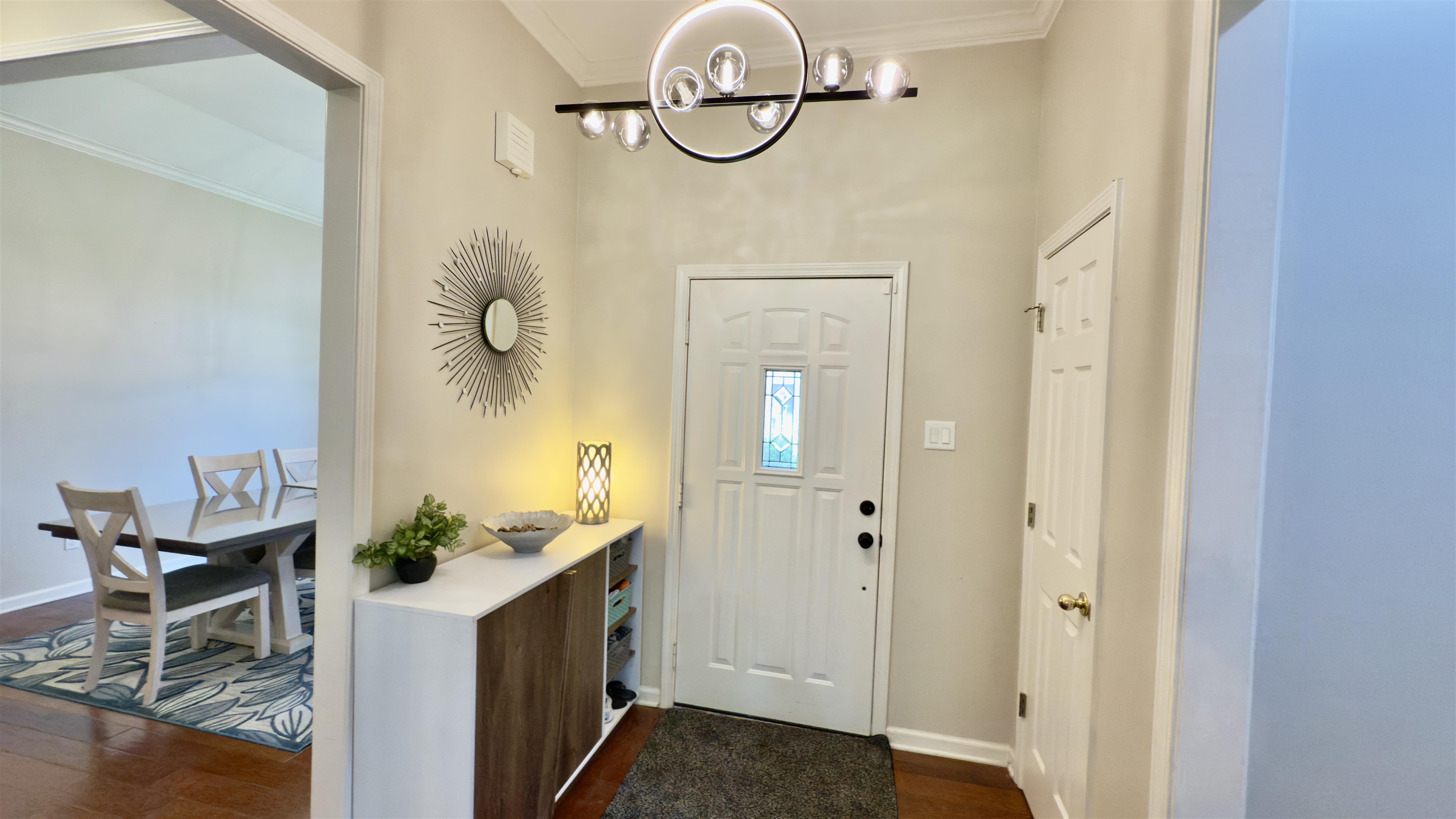 1082 Sugar Lane Collierville, TN 38017 - Photo 3 of 25 a bathroom with a granite countertop sink a vanity and a mirror