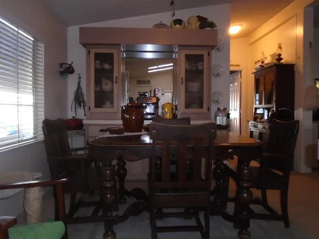 a view of a dining room with furniture