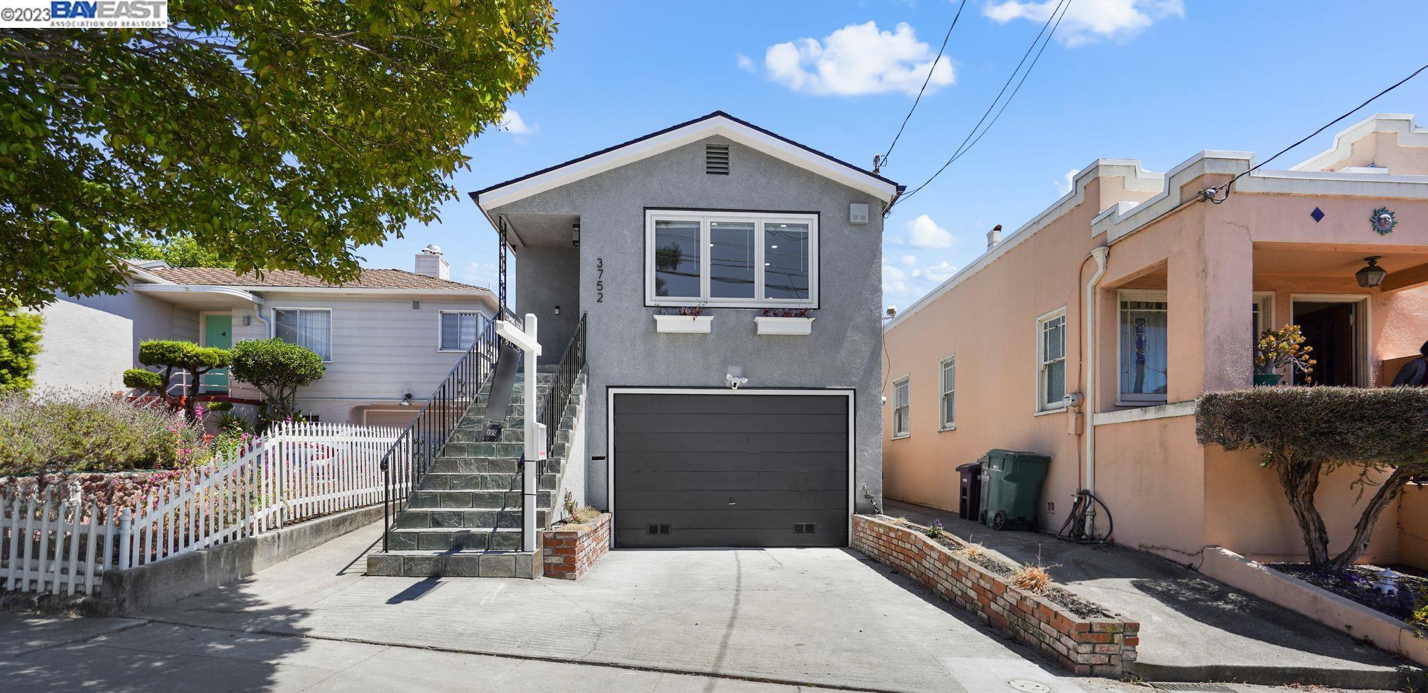 a front view of a house with parking