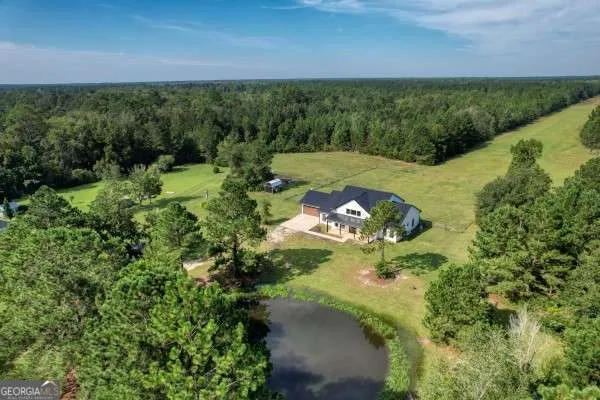 a view of a lake with a building in the background