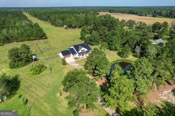 a view of a lake with a yard