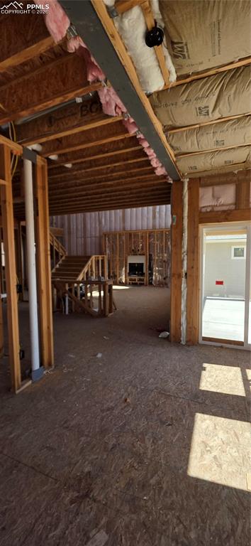 10754 Rolling Ranch Drive Peyton, CO 80831 - Photo 11 of 33 dining to living room