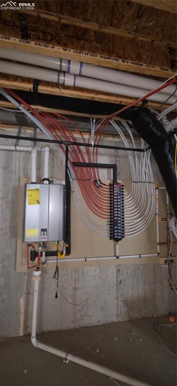 10754 Rolling Ranch Drive Peyton, CO 80831 - Photo 15 of 33 Utilities with tankless water heater