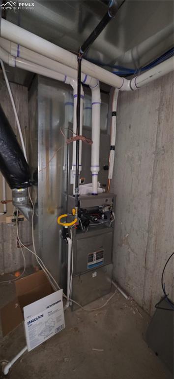 10754 Rolling Ranch Drive Peyton, CO 80831 - Photo 16 of 33 Utility room featuring heating unit