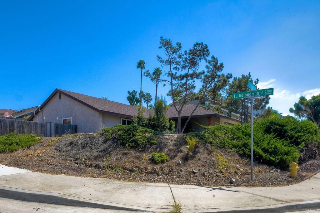 6428 El Perico Lane Carlsbad, CA 92009 - Photo 35 of 35 a house view with a garden space