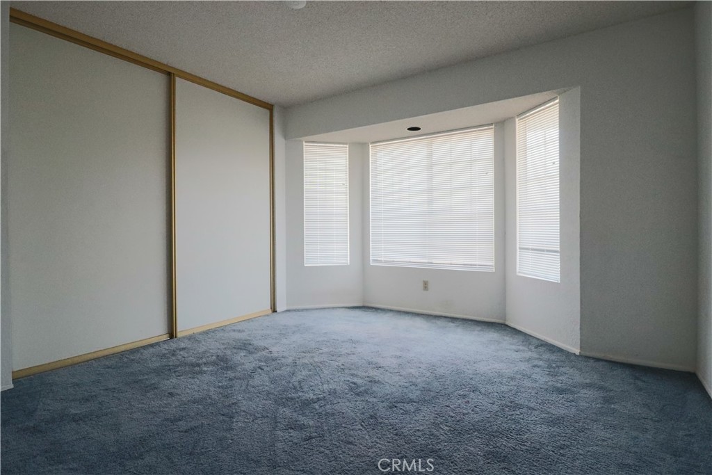 4752 Flying H Road Twentynine Palms, CA 92277 - Photo 37 of 55 a view of an empty room with a window