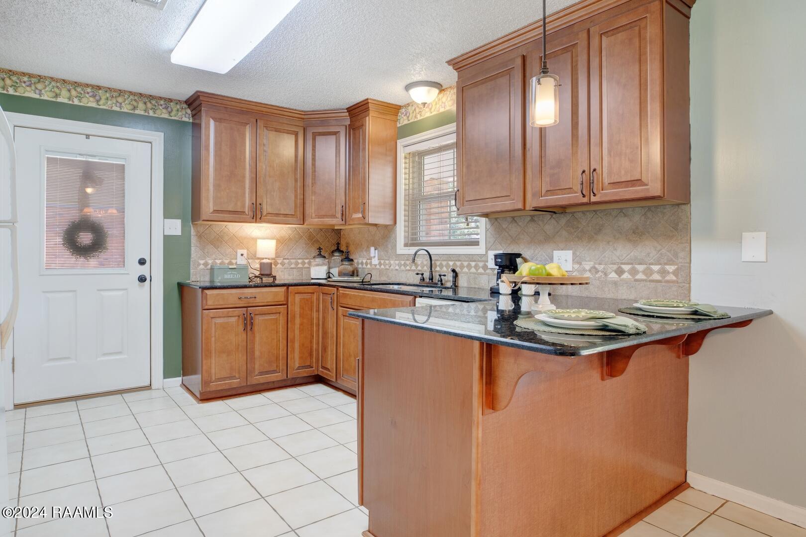 500 Interlude Road New Iberia, LA 70563 - Photo 6 of 37 Wood cabinets