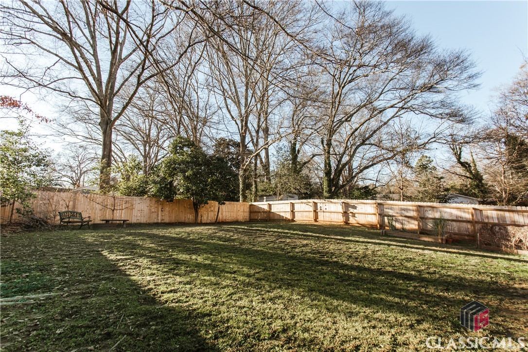 165 Sylvan Road Athens, GA 30606 - Photo 29 of 34 the sunny back yard is fully fenced