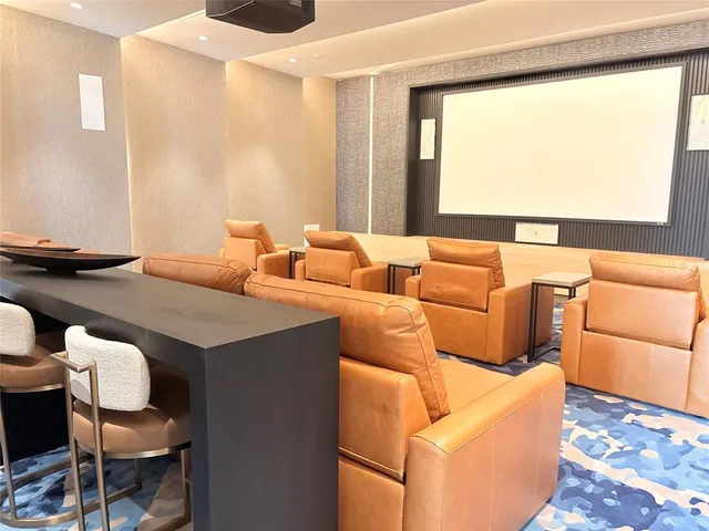 a view of a swimming pool with a yard