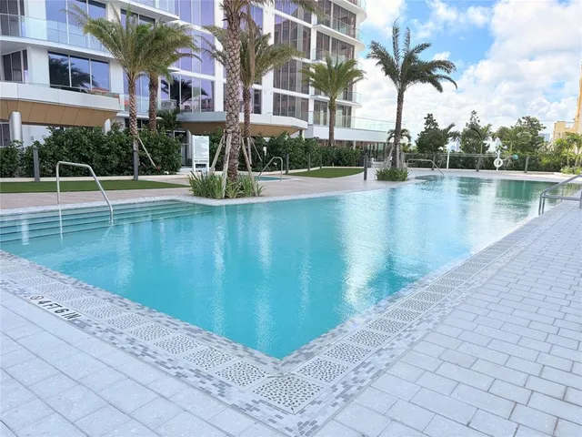 a view of balcony with furniture