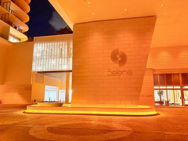 a view of a chair and table in the balcony