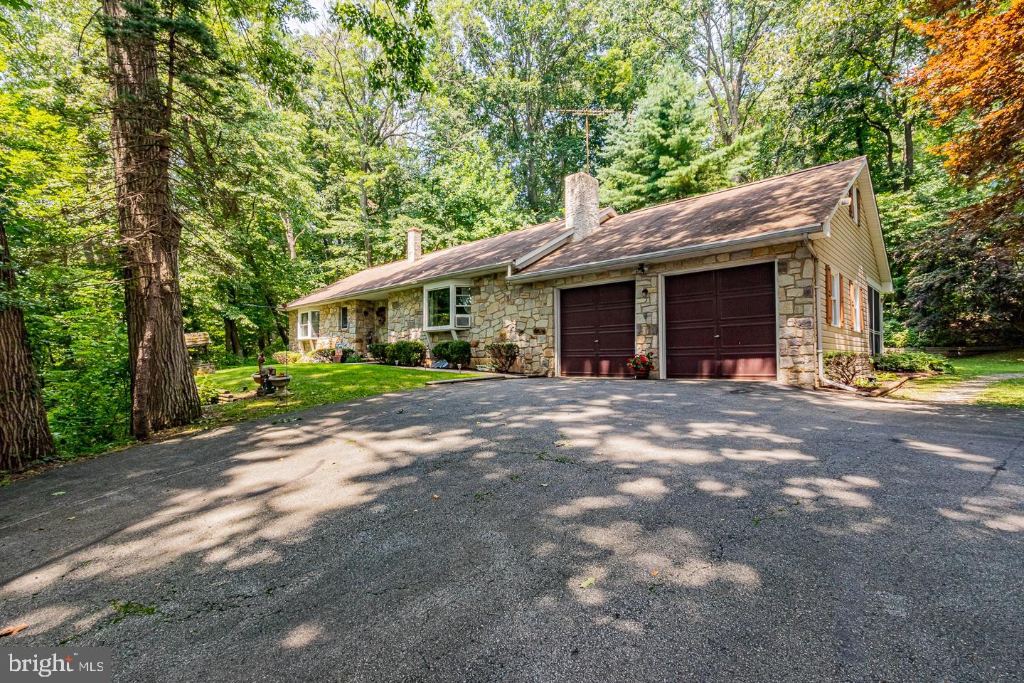 Front view - note LARGE driveway parking area