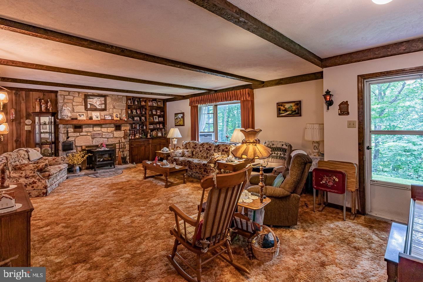 Large living rm, fireplace stone dug from the lot