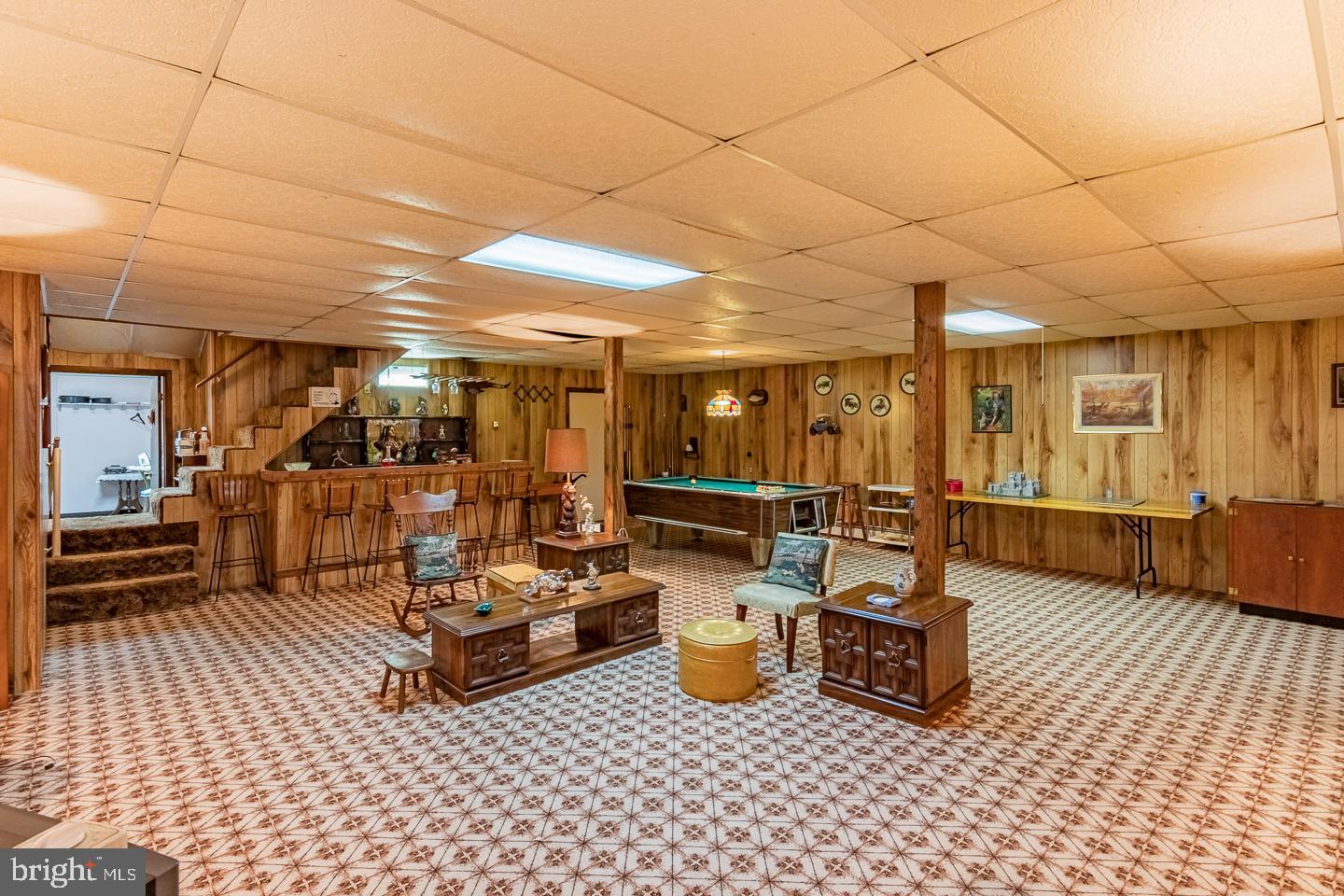 Finished basement bar, pool table spacious