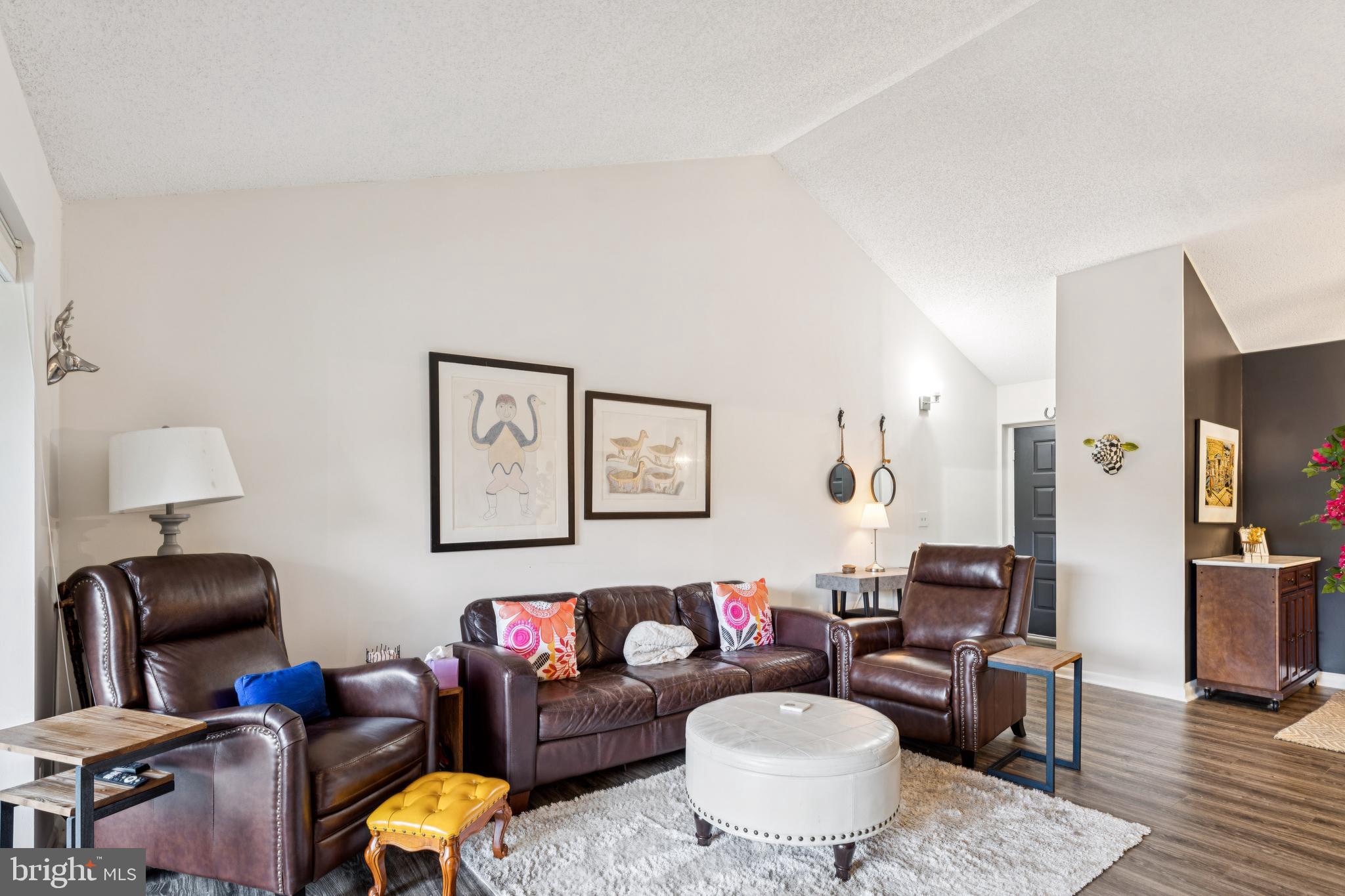 15301 Beaverbrook Court, Unit 923K Silver Spring, MD 20906 - Photo 4 of 25 a living room with furniture
