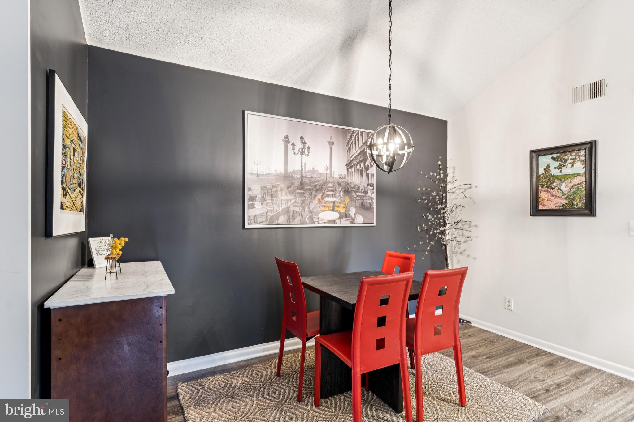 15301 Beaverbrook Court, Unit 923K Silver Spring, MD 20906 - Photo 6 of 25 a dining room with furniture and window